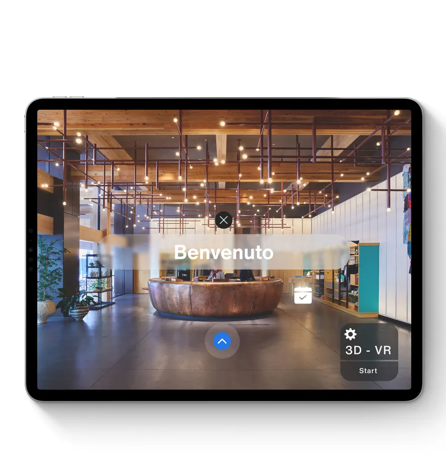 Tablet con un virtual tour visualizzato sullo schermo di una lobby di Hotel e icone per interagire con il tour virtuale